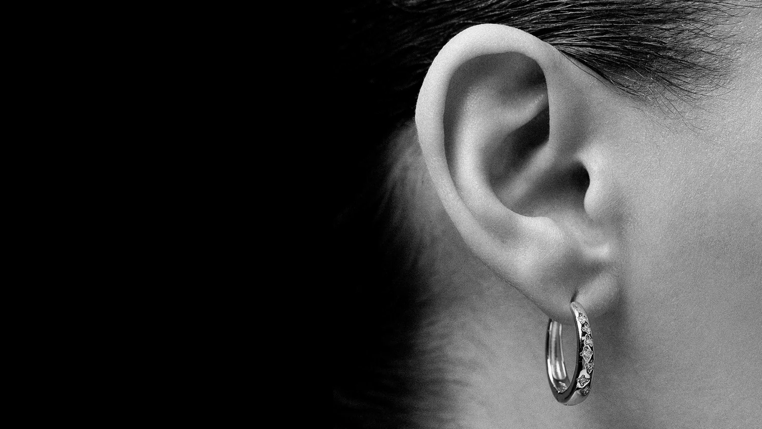 earlobe piercing