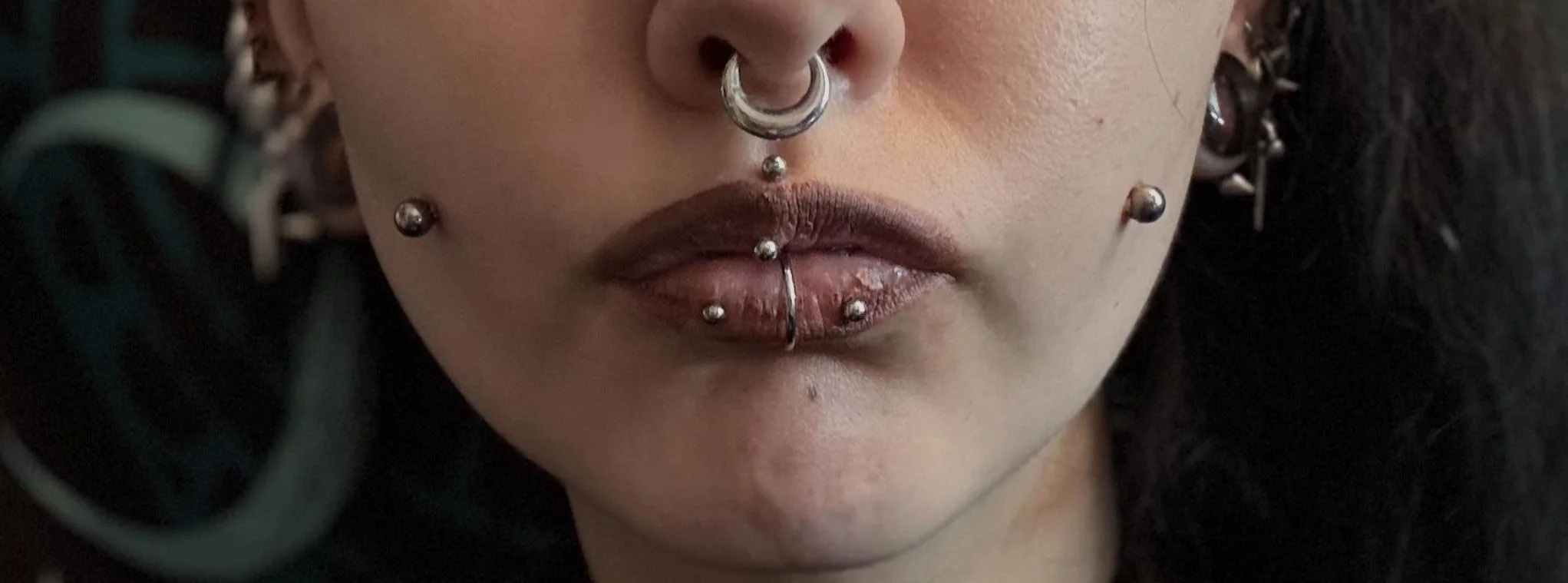 cheek piercing