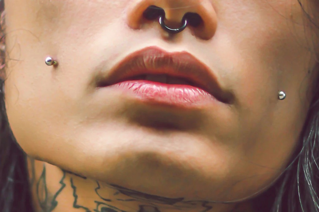 cheek piercing