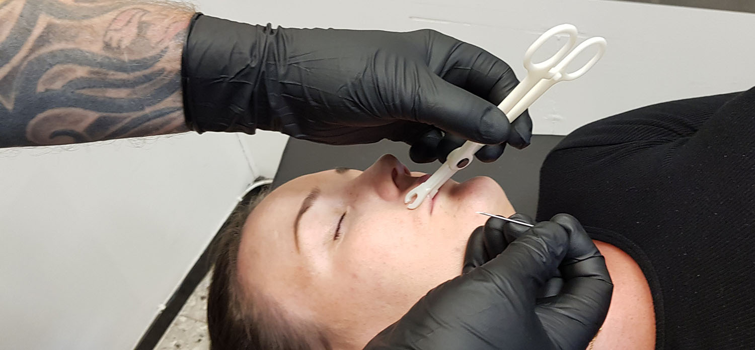 find a piercing artist